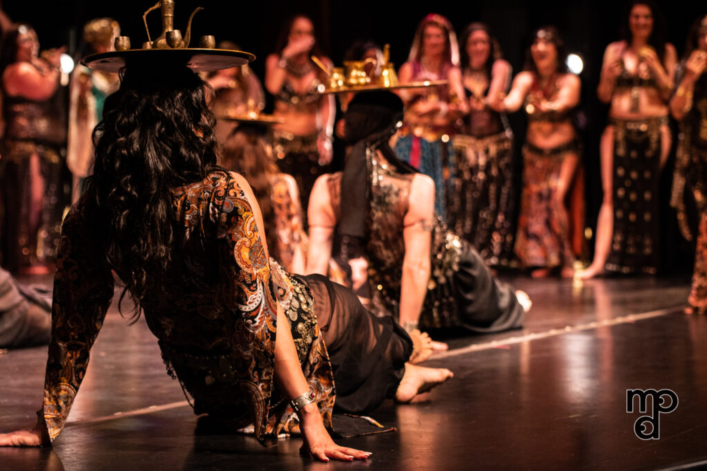 Dancers perform Suhaila Salimpour's Tray Dance choreography as part of the Bal Anat performance in El Cerrito, CA, 2018.
