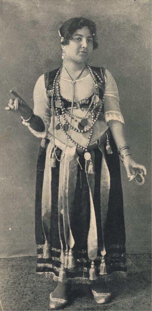 A performer of the Danse Du Ventre. From The Columbian Gallery: A Portfolio of Photographs from the World's Fair. Chicago: Werner Company (1894)