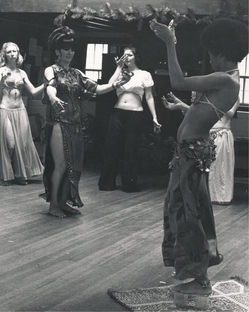 Jamila teaching a student to perform on water glasses (ca. 1969).